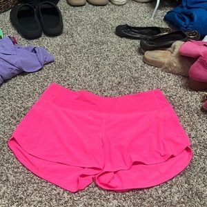Neon pink lululemon shorts